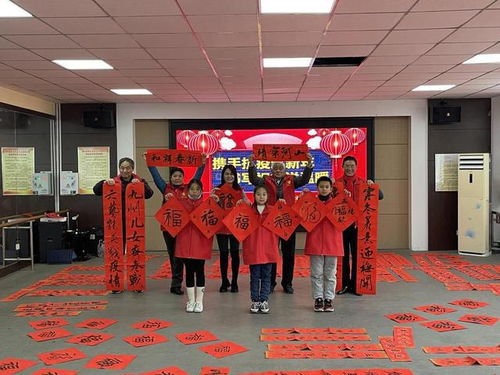 攜手抗疫過新年 開封市順河回族區(qū)組織文化志愿者為居民送溫暖寫春聯(lián)